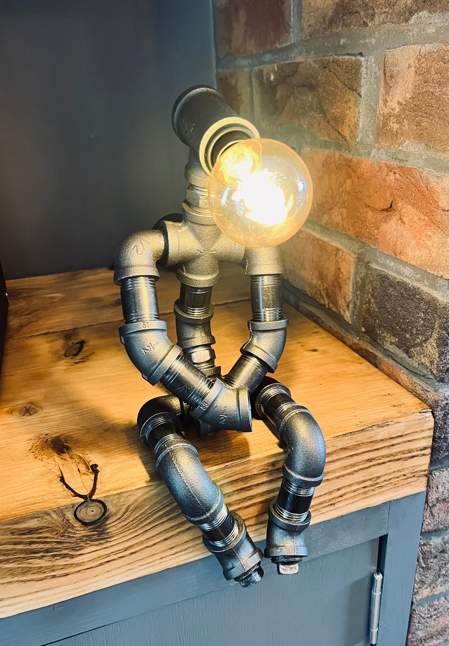 The Pensive Man Industrial Iron Pipe Lamp & Vintage Bulb