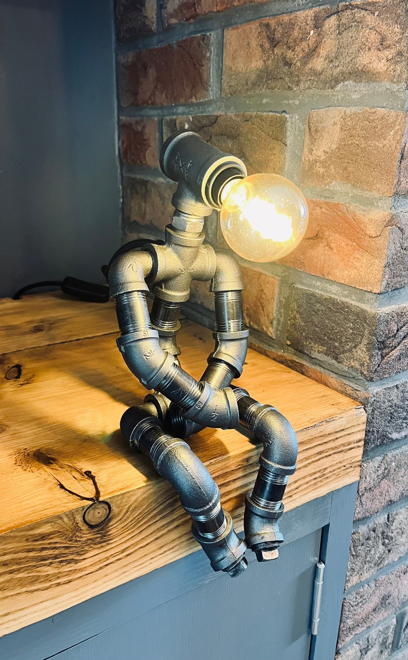 The Pensive Man Industrial Iron Pipe Lamp & Vintage Bulb