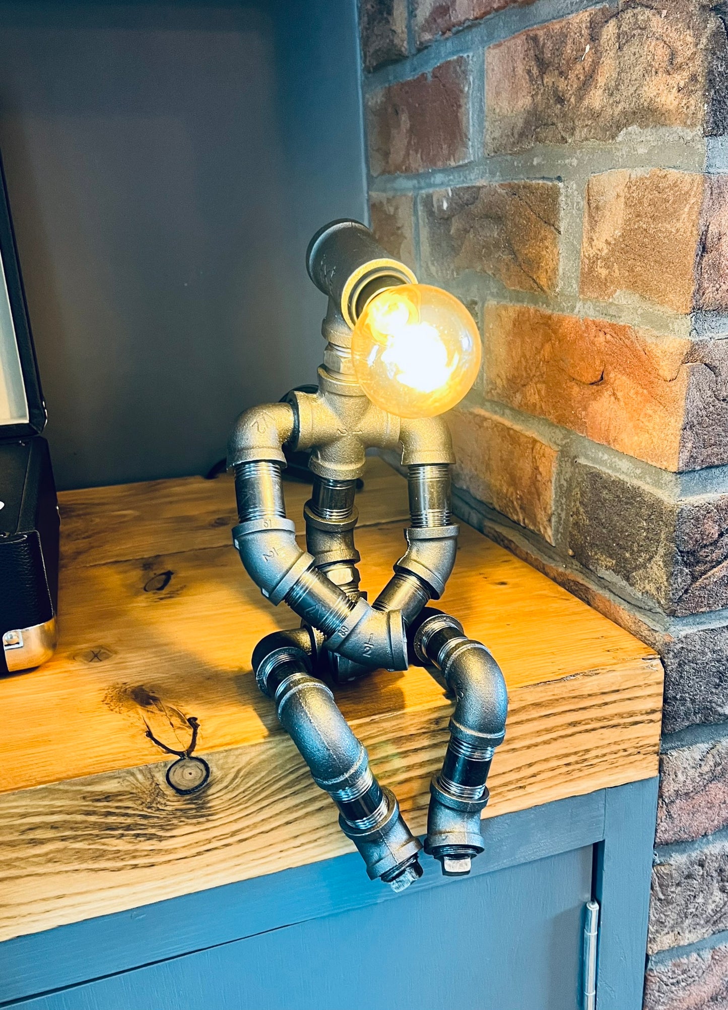 The Pensive Man Industrial Iron Pipe Lamp & Vintage Bulb