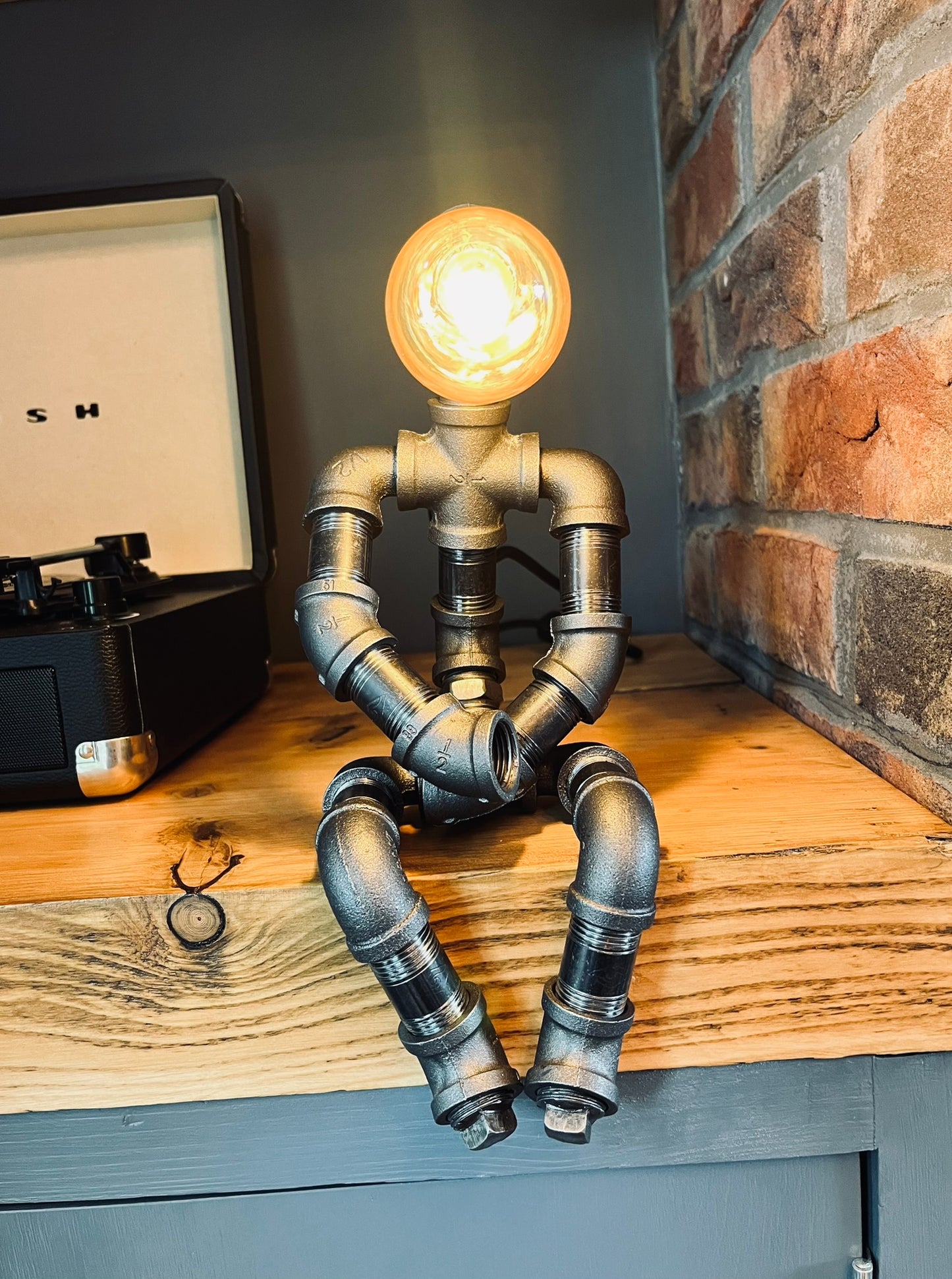 The Pensive Man Industrial Iron Pipe Lamp & Vintage Bulb