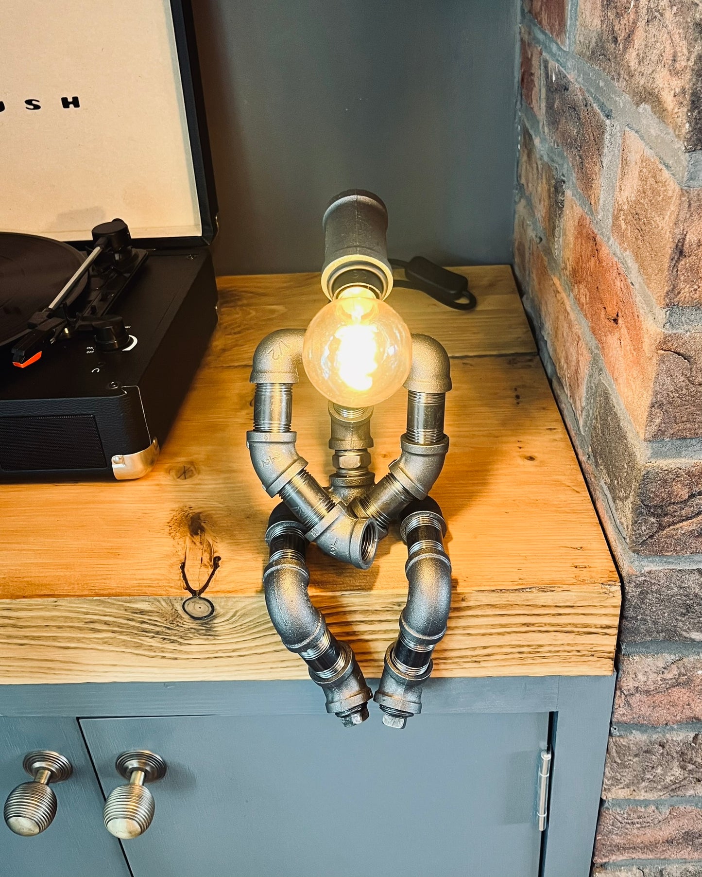 The Pensive Man Industrial Iron Pipe Lamp & Vintage Bulb