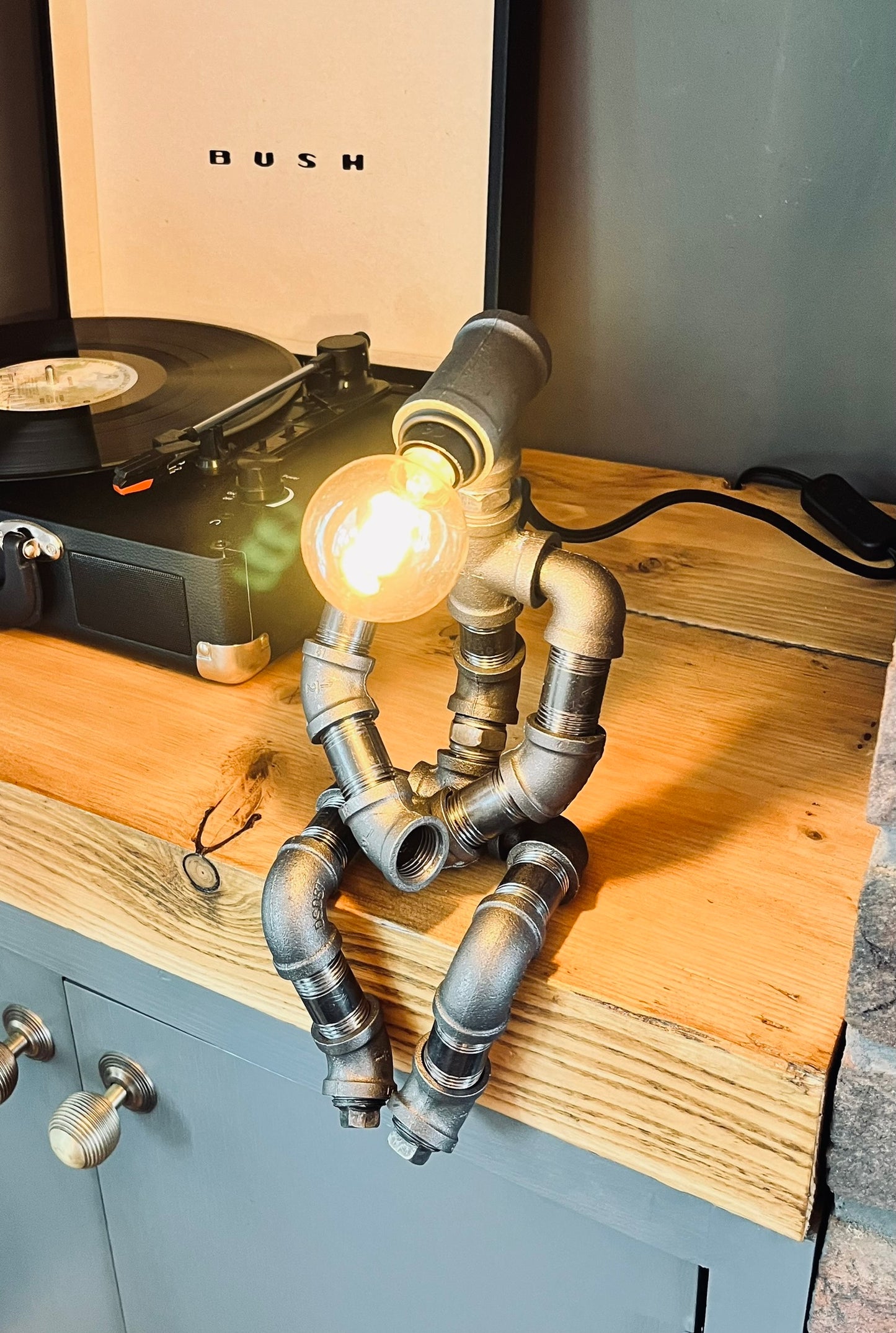 The Pensive Man Industrial Iron Pipe Lamp & Vintage Bulb