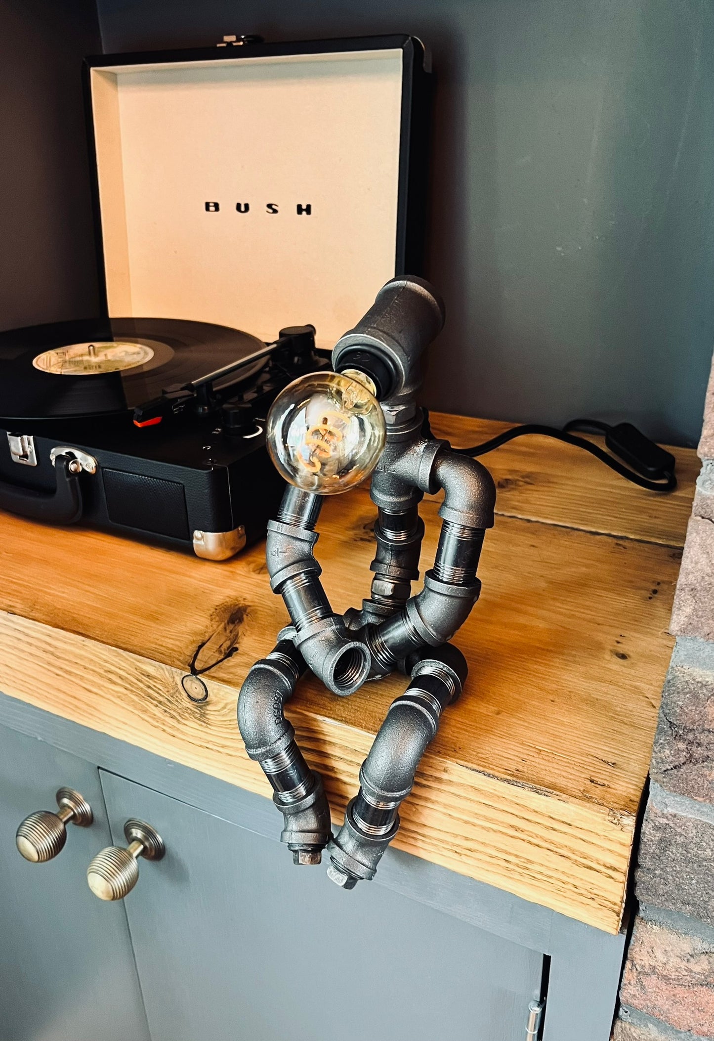 The Pensive Man Industrial Iron Pipe Lamp & Vintage Bulb