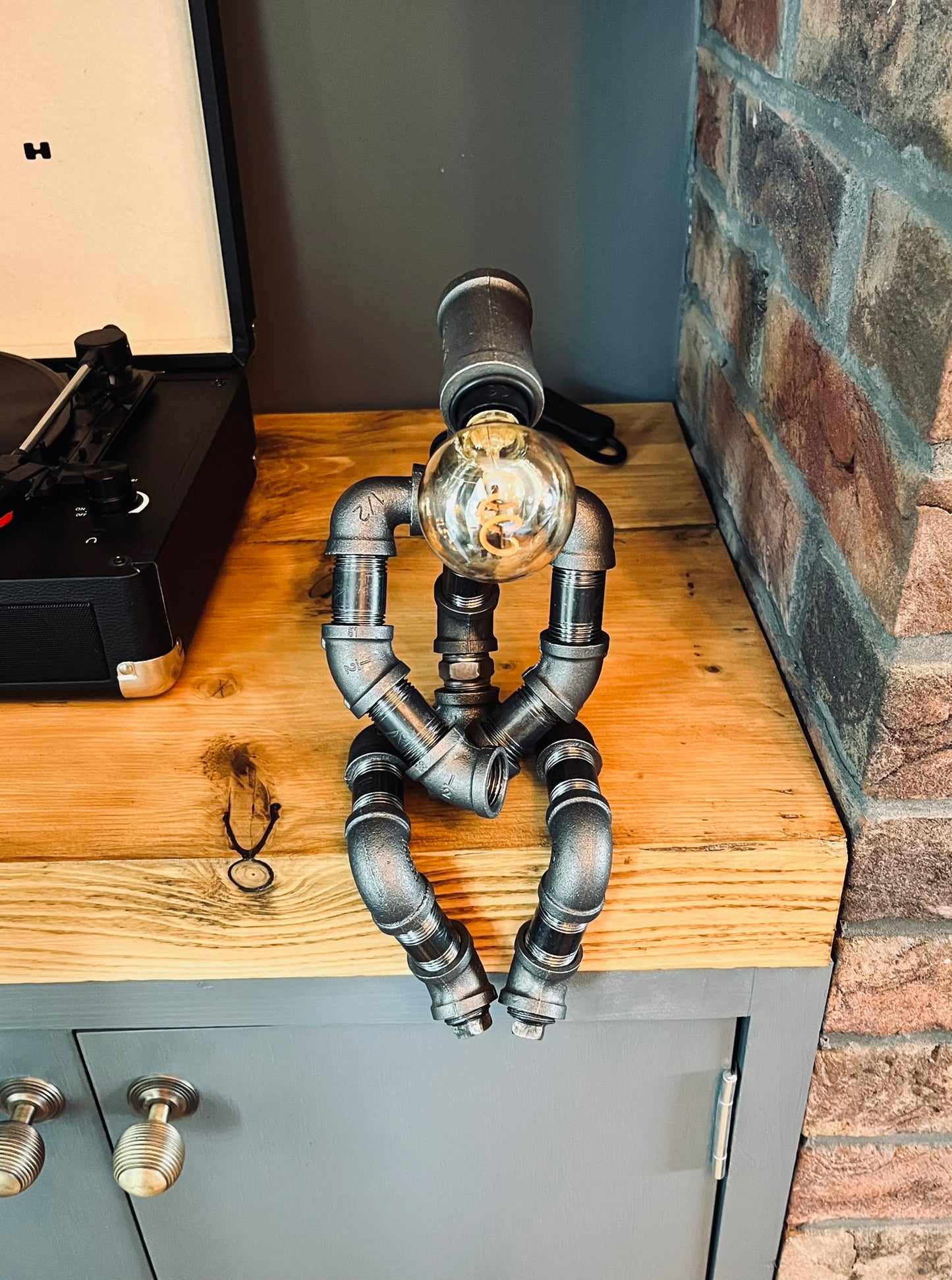 The Pensive Man Industrial Iron Pipe Lamp & Vintage Bulb