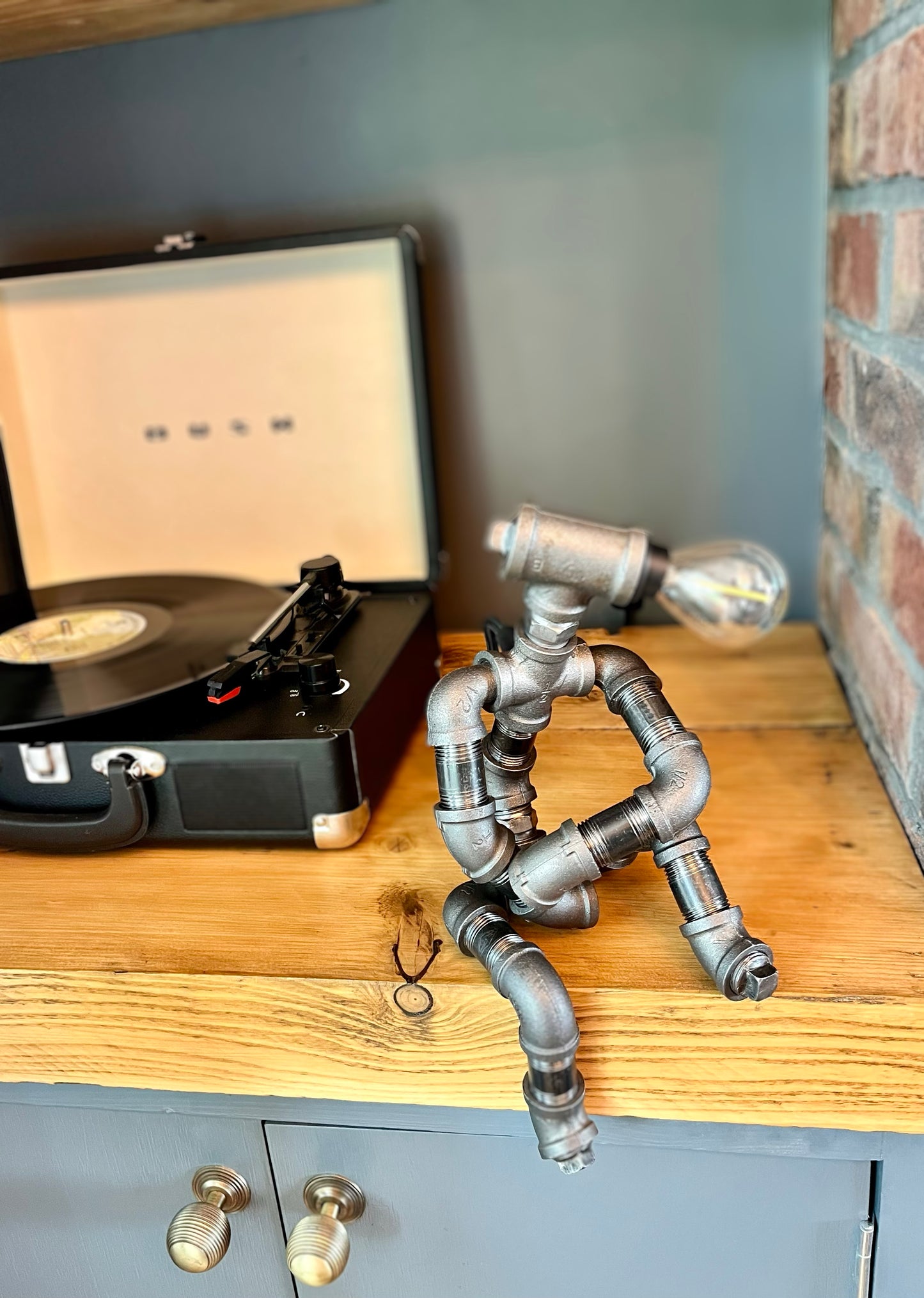 The Companion Industrial Iron Pipe Person Robot Lamp & Modern White Bulb