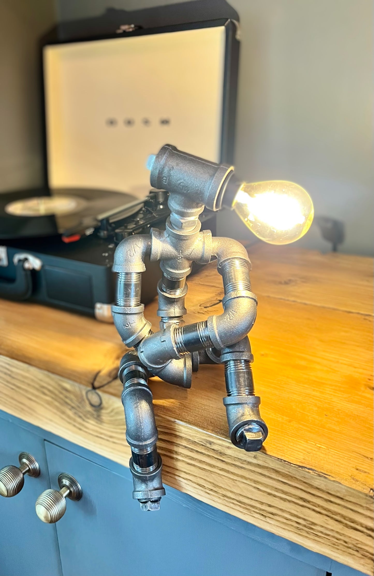 The Companion Industrial Iron Pipe Person Robot Lamp & Modern White Bulb