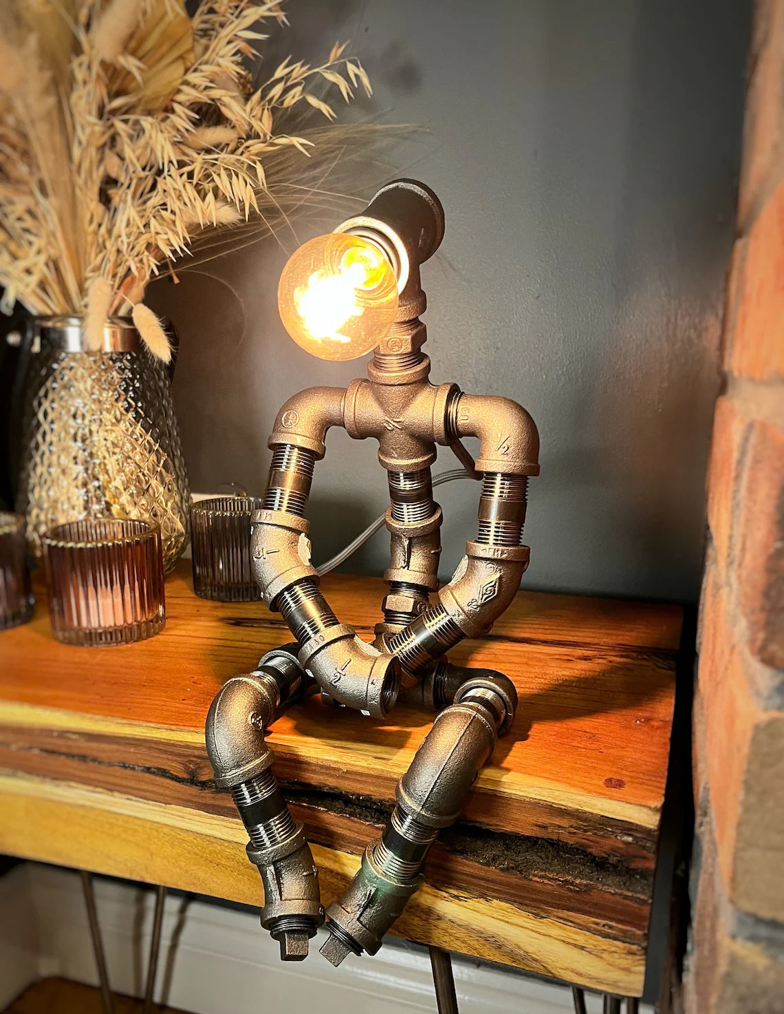 The Pensive Man Industrial Style Iron Pipe Man Lamp Vintage Bulb