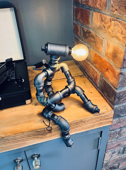 The Companion Industrial Iron Pipe Person Robot Lamp & Vintage Bulb