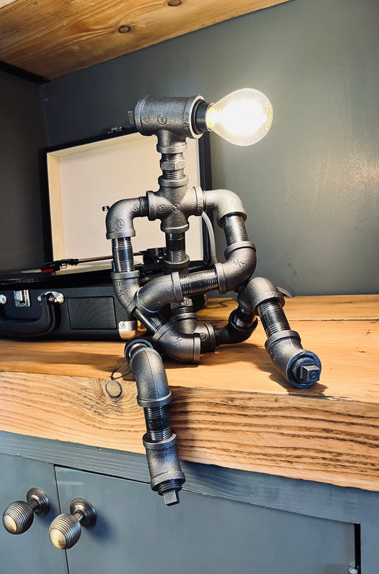 The Companion Industrial Iron Pipe Person Robot Lamp & Modern White Bulb