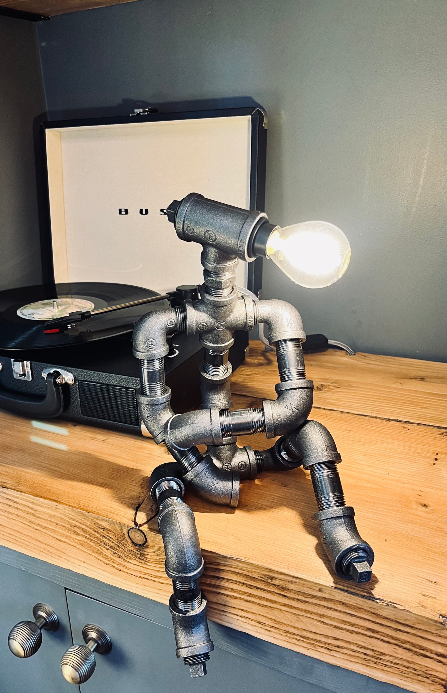 The Companion Industrial Iron Pipe Person Robot Lamp & Modern White Bulb