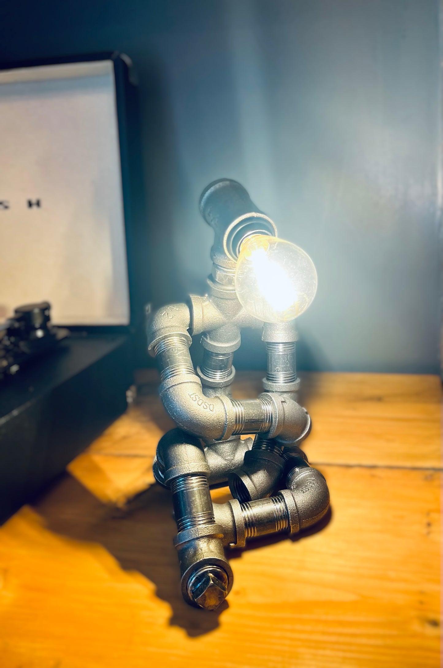 The Thinking Man Industrial Iron Pipe Lamp & Modern White Bulb