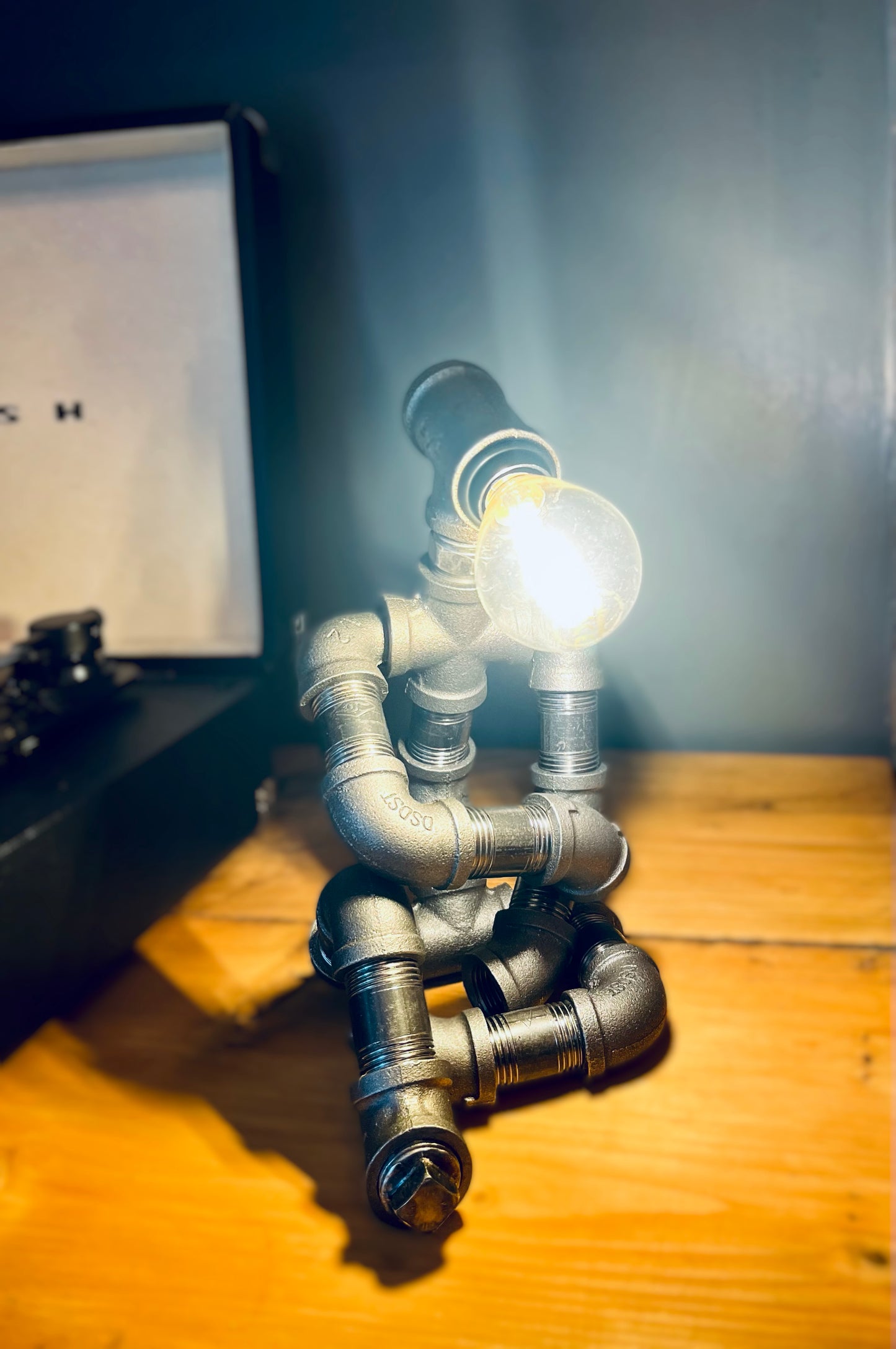 The Thinking Man Industrial Iron Pipe Lamp & Modern White Bulb