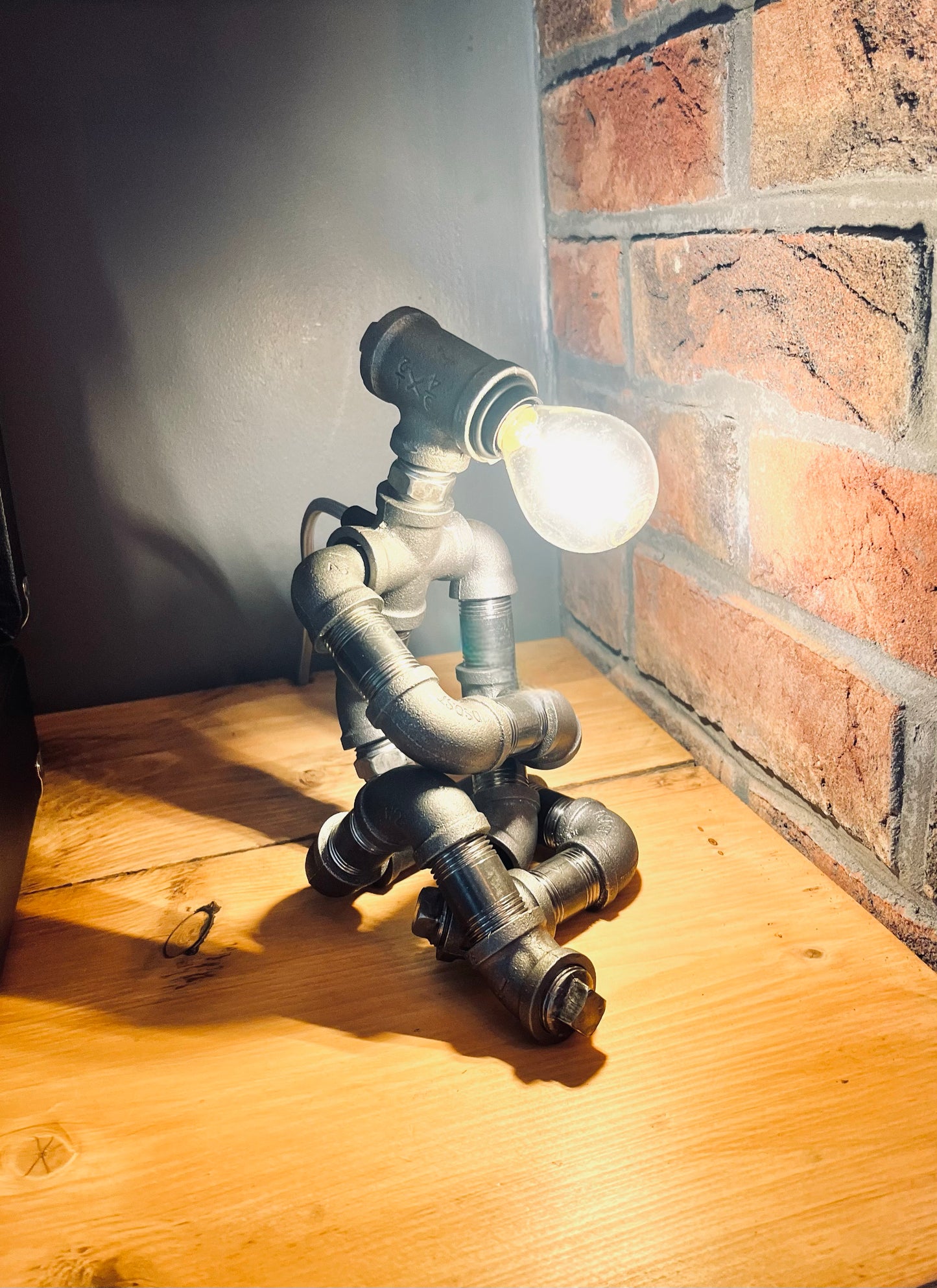 The Thinking Man Industrial Iron Pipe Lamp & Modern White Bulb