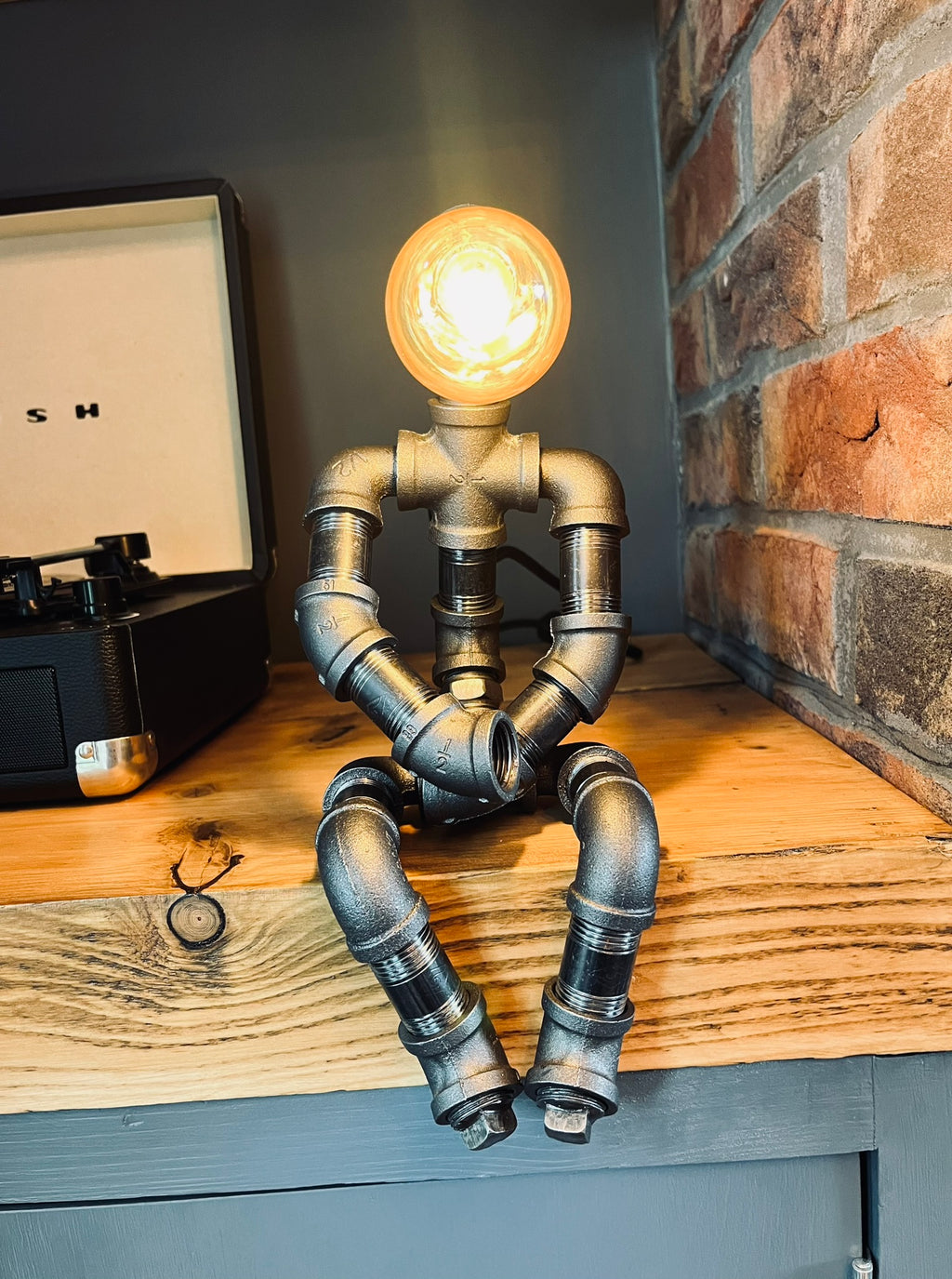 The Pensive Man Industrial Iron Pipe Lamp & Vintage Bulb