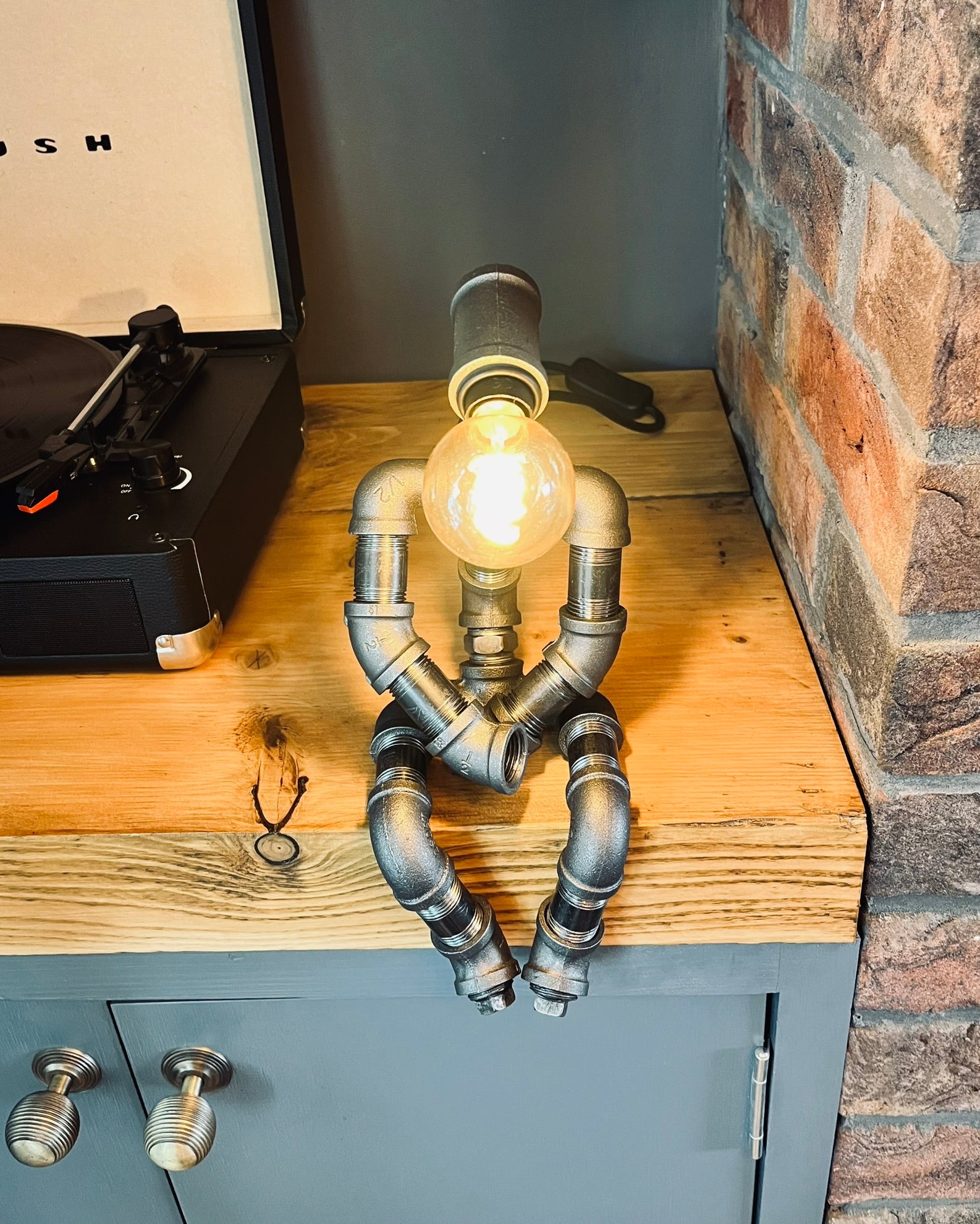 The Pensive Man Industrial Iron Pipe Lamp & Vintage Bulb