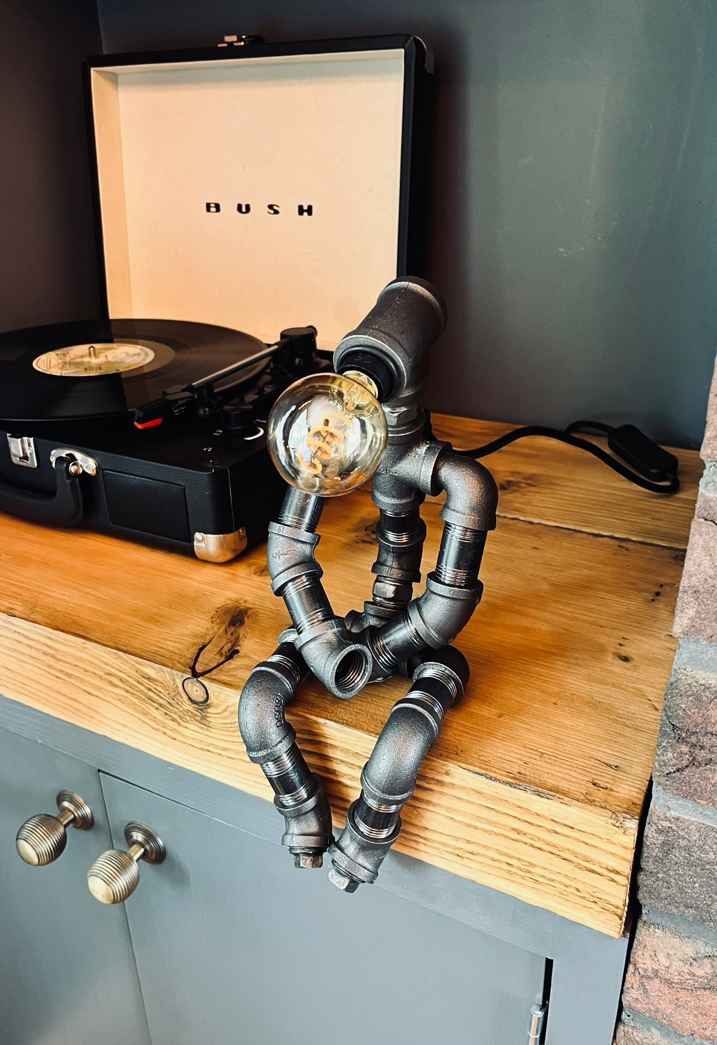 The Pensive Man Industrial Iron Pipe Lamp & Vintage Bulb