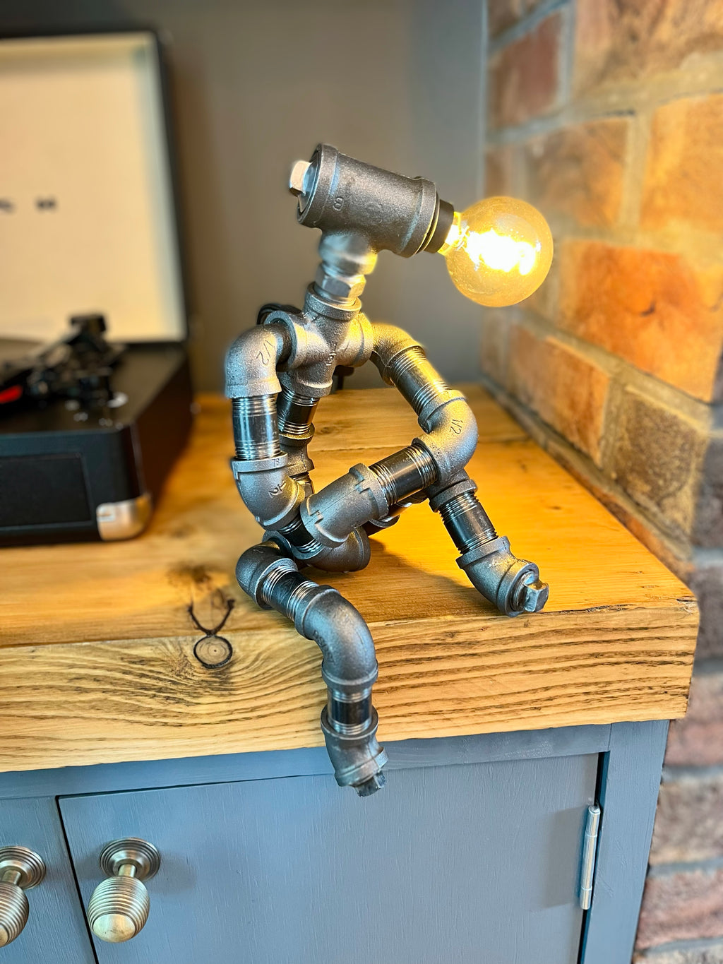 The Companion Industrial Iron Pipe Person Robot Lamp & Vintage Bulb