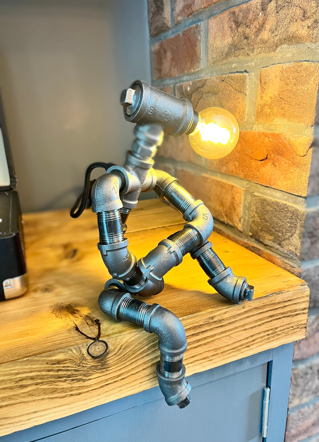 The Companion Industrial Iron Pipe Person Robot Lamp & Vintage Bulb