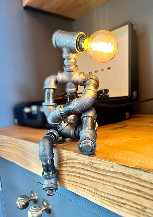 The Companion Industrial Iron Pipe Person Robot Lamp & Vintage Bulb