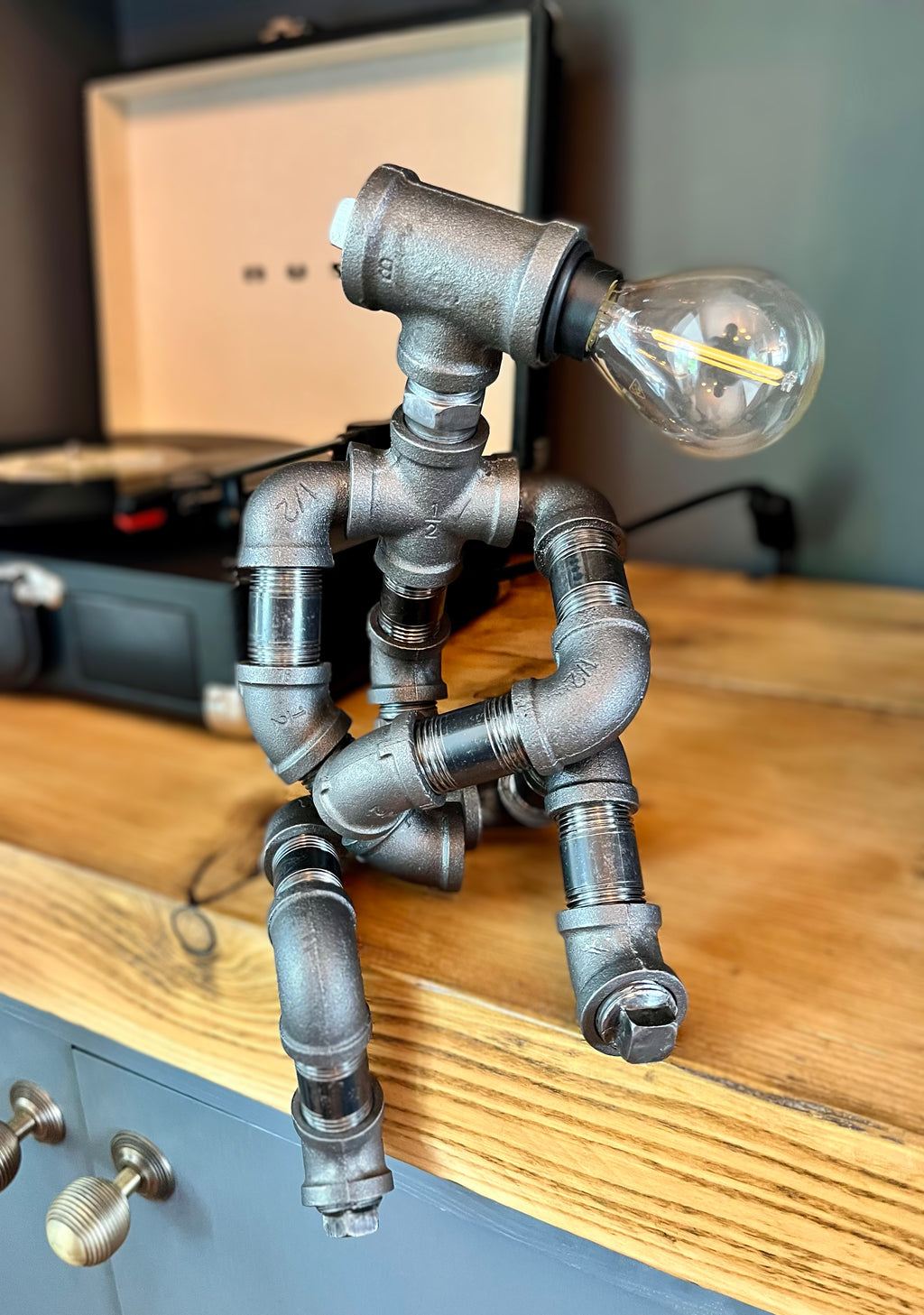 The Companion Industrial Iron Pipe Person Robot Lamp & Modern White Bulb