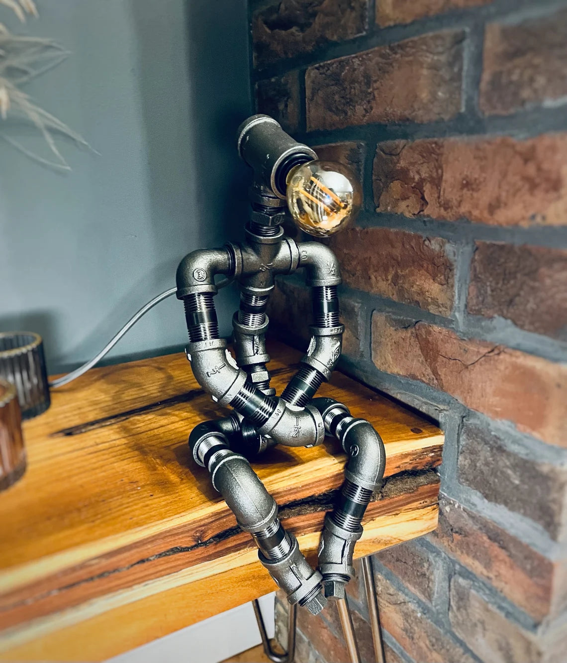 The Pensive Man Industrial Style Iron Pipe Man Lamp & Modern White Bulb ...